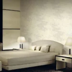 ARMANI / CASA Refined Structure 2 luxury wallcovering featuring an elegant ivory textured surface with subtle woven relief, ideal for premium contemporary interiors and sophisticated wall design.