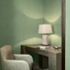 Armani Casa Refined Structure 2 luxury wallcovering in soft sage green with fine woven texture, premium Italian designer wallpaper for elegant modern interiors.