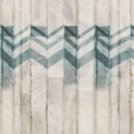 Armani Casa Refined Structure 2 luxury wallcovering with geometric chevron accents in muted blue and ivory stone textures for premium interior walls.