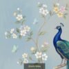 "Beautiful peacock perched on a blooming tree with pastel flowers and butterflies on a soft blue textured background."