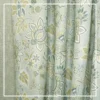 Light green floral curtain with elegant paisley pattern tied with rope tieback, perfect for living room and bedroom home decor