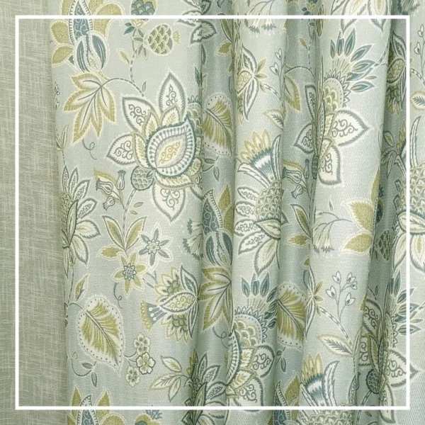 Light green floral curtain with elegant paisley pattern tied with rope tieback, perfect for living room and bedroom home decor