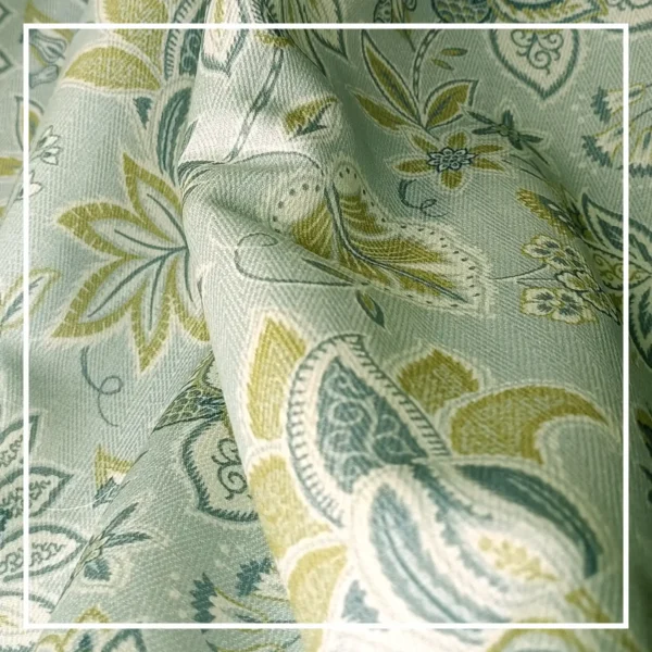 Light green floral curtain with elegant paisley pattern tied with rope tieback, perfect for living room and bedroom home decor