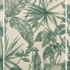 Green tropical leaf print curtain fabric on neutral base with pearl tieback, botanical palm pattern drapes for modern interiors.