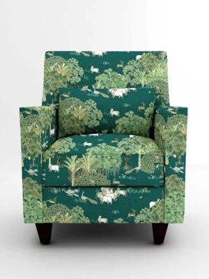 Luxury emerald green forest wildlife print upholstery fabric on accent chair with trees and animals, premium sofa and cushion upholstery for elegant living room interiors