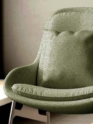 Light sage green textured upholstery fabric with subtle woven pattern, premium sofa and cushion fabric for elegant modern interiors