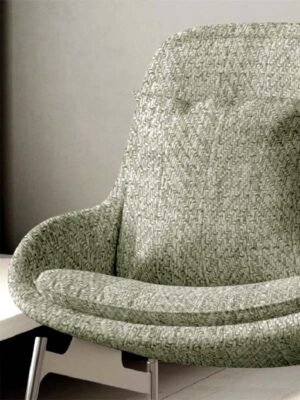 Light sage green herringbone textured upholstery fabric armchair with modern curved design, premium chair and sofa fabric for luxury living room interiors