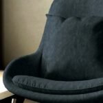 Luxury dark teal suede velvet upholstery fabric on modern accent chair with plush cushioning, premium sofa and cushion upholstery for elegant living room interiors