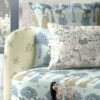 Soft beige floral upholstery fabric with delicate green botanical motifs, premium sofa and cushion fabric for elegant living room interiors