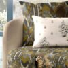 Luxury ikat pattern upholstery fabric on modern sofa with designer cushion, premium sofa and cushion fabric for elegant contemporary living room interiors