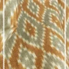 Yellow and beige ikat pattern curtain fabric with geometric motifs, ethnic-inspired designer curtains for modern Indian interiors.