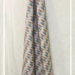 Pastel multicolor ikat pattern curtain fabric with geometric motifs, modern designer curtains for contemporary Indian interiors.