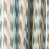 Pastel multicolor ikat pattern curtain fabric with geometric motifs, modern designer curtains for contemporary Indian interiors.