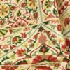 Traditional floral printed curtain fabric with red and green Persian motifs on beige cotton base, elegant decorative drapery fabric for living room and bedroom interiors