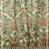 Ottoman Persian inspired curtain fabric with intricate floral and ornamental motifs in green and maroon tones, luxury traditional curtains for elegant interiors.