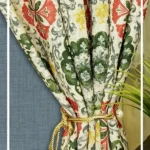 Ottoman Persian floral curtain fabric with multicolor ornamental motifs on a neutral base, luxury traditional designer curtains for elegant interiors.