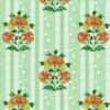 Vintage floral sofa upholstery fabric in pastel green with orange and yellow flower motifs, striped pattern, and classic rolled arm sofa design for elegant living room interiors.