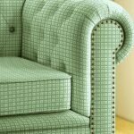 Luxury mint green geometric sofa upholstery fabric with woven texture and nailhead trim, premium furniture fabric for elegant living room interiors