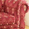 Luxury ikat pattern upholstery fabric in rich red tones for sofa and chair, premium designer furniture fabric for elegant living room interiors