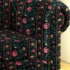 Luxury dark floral sofa upholstery fabric with rich botanical stripes in emerald green, pink and gold tones, premium cushion and sofa fabric for elegant living room interiors