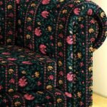 Luxury dark floral sofa upholstery fabric with rich botanical stripes in emerald green, pink and gold tones, premium cushion and sofa fabric for elegant living room interiors
