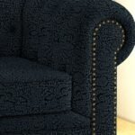 Luxury black damask sofa upholstery fabric with classic rolled arm design and brass nailhead trim, premium cushion and sofa upholstery for elegant living room interiors.