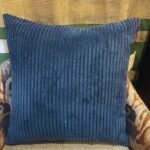 Luxury deep blue ribbed cushion cover fabric upholstery with plush corduroy texture for premium sofas and elegant modern interiors