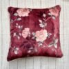Luxury burgundy floral cushion cover fabric with soft blush roses and delicate botanical detailing, styled for elegant premium interiors.