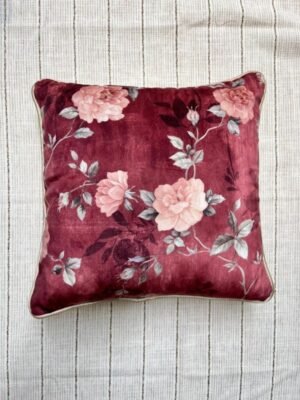 Luxury burgundy floral cushion cover fabric with soft blush roses and delicate botanical detailing, styled for elegant premium interiors.