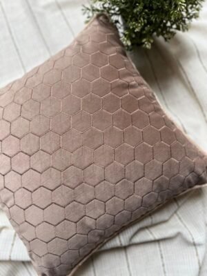 Luxury taupe geometric cushion cover fabric with elegant hexagon texture, styled on neutral bedding for premium modern interiors.