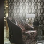 Luxury black and silver geometric wallpaper with symmetrical fan-shaped art-deco motifs for premium interior décor