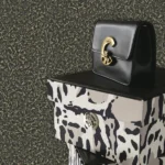 Luxury dark textured wallpaper with subtle metallic grain finish for premium and modern interiors