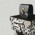 Soft ivory / Silver / grey textured luxury wallpaper with subtle stone-like finish for elegant and premium interiors