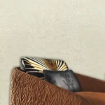 Roberto Cavalli Volume 8 luxury textured wallpaper in soft ivory and pearl tones with a subtle animal-inspired pattern for elegant premium interiors.