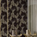 Roberto Cavalli Volume 9 luxury embossed wallpaper with metallic gold palm leaf design on deep charcoal black stone-textured background for premium interiors