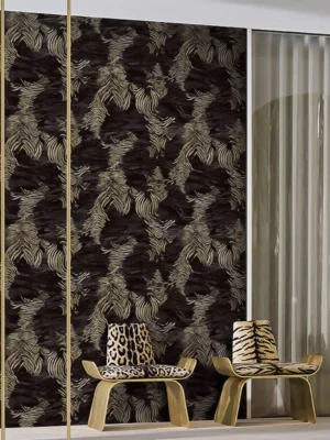 Roberto Cavalli Volume 9 luxury embossed wallpaper with metallic gold palm leaf design on deep charcoal black stone-textured background for premium interiors