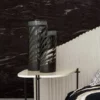 Roberto Cavalli Volume 9 luxury textured wallpaper in deep charcoal black with dramatic stone-effect finish for premium interior walls