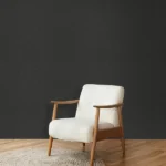 Roberto Cavalli Volume 9 luxury textured wallpaper with subtle animal-inspired pattern in deep charcoal black for premium statement interiors