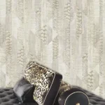 Roberto Cavalli Volume 8 luxury wallpaper with light geometric patchwork inspired by exotic animal textures in ivory, cream and soft beige tones for premium interiors