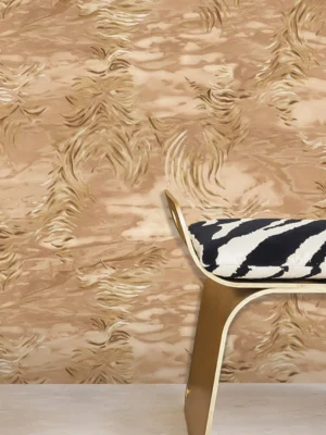 Roberto Cavalli Volume 9 luxury embossed wallpaper with abstract palm leaf design in rich gold on warm caramel stone-textured background for premium interiors