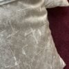 Luxury ivory textured cushion cover in premium designer fabric with subtle geometric weave pattern, styled for modern neutral interiors.