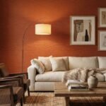 Warm rust orange plain texture fabric with subtle woven finish – premium upholstery and curtain fabric by Ruby The Furnishing Studio