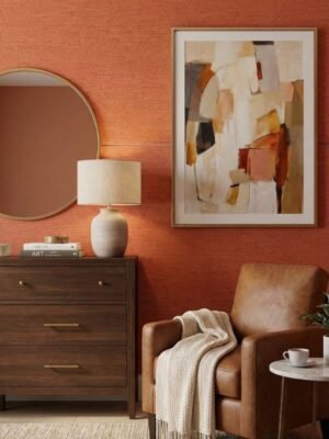 Burnt orange textured upholstery fabric with woven micro pattern – premium furnishing material for sofas, chairs and cushions by Ruby The Furnishing Studio Ghatkopar East