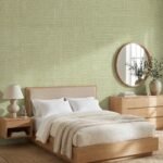 Soft green linen texture wallpaper for modern wall décor by Ruby The Furnishing Studio – elegant fabric look wall covering for luxury interiors.