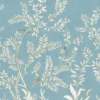 Elegant blue floral mural wallpaper with delicate white botanical branches and birds in a luxury bedroom setting with wooden bed, soft lighting, and classic décor