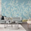 Elegant blue floral mural wallpaper with delicate white botanical branches and birds in a luxury bedroom setting with wooden bed, soft lighting, and classic décor
