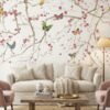 Elegant blue floral mural wallpaper with cherry blossom branches and colorful butterflies, Daisy Bennett mural collection by Ruby The Furnishing Studio, ideal for modern living room décor.