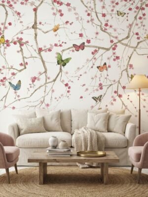 Elegant blue floral mural wallpaper with cherry blossom branches and colorful butterflies, Daisy Bennett mural collection by Ruby The Furnishing Studio, ideal for modern living room décor.