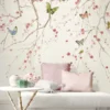 Elegant blue floral mural wallpaper with cherry blossom branches and colorful butterflies, Daisy Bennett mural collection by Ruby The Furnishing Studio, ideal for modern living room décor.