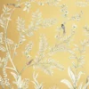 Elegant golden yellow floral mural wallpaper with delicate tree branches, blooming flowers, and birds in a luxury living room with blush seating and ornate mirror